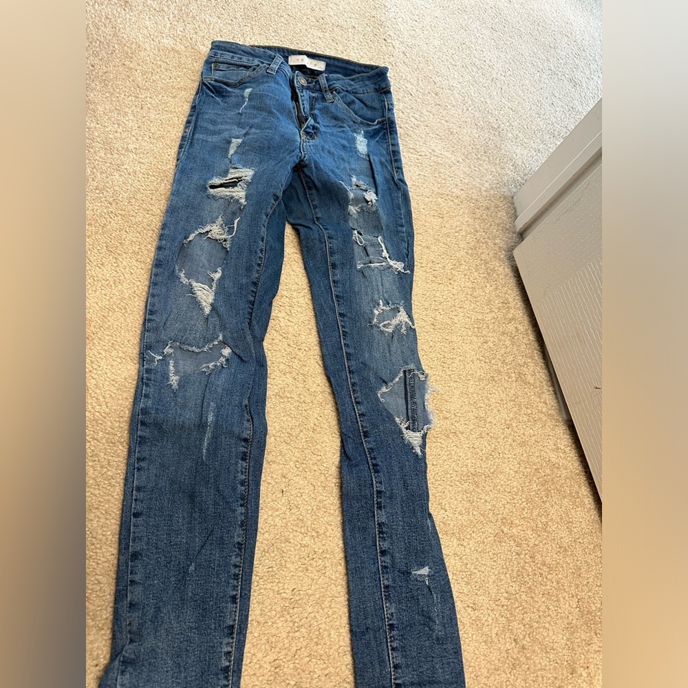 Blue ripped jeans
